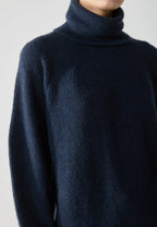 Dira - Plain knit sweater with a high neck